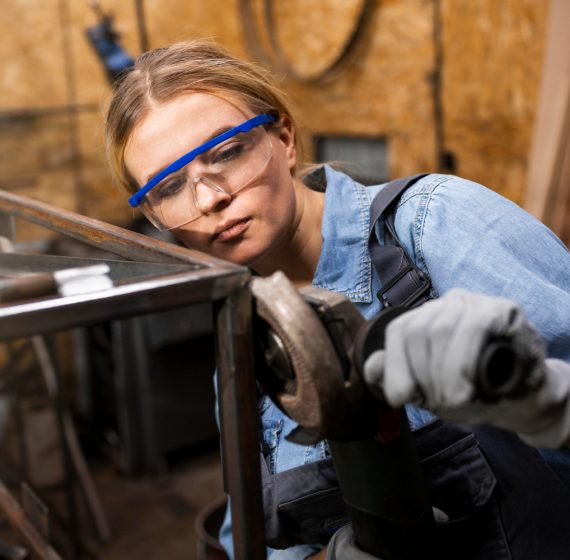 female-welder-working-studio